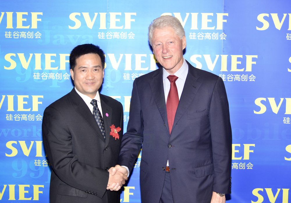 Cao Fang with President Clinton
