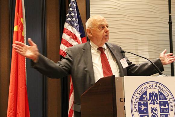 Mr. Adlai Stevenson, US Senator, is delivering a speech at the Chicago Enterprise Matchmaking Conference